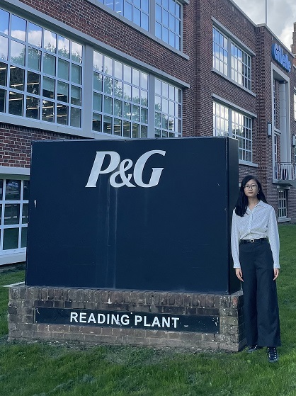 Portrait picture of Emily Na outside of Proctor and Gamble Headquarters
