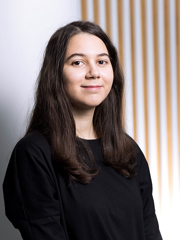 Portrait picture of Zsofi Kutasi wearing a black top