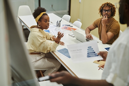 man and woman having a meeting in the office
